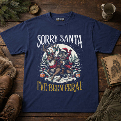 Sorry Santa I've Been Feral Comfort Colors 1717 Shirt, Funny Christmas Wolf Riding Reindeer Graphic Tee, Holiday Gift Tee
